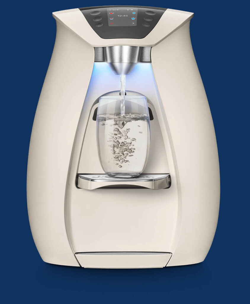 Home water dispenser pouring into clear glass