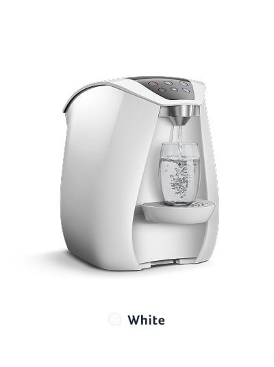 White water purifier dispensing into glass