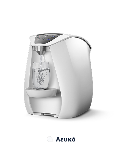 Λευκή μηχανή καφέ με γυάλινο ποτήρι.