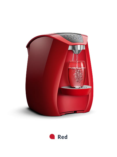 Red countertop soda maker with glass cup.